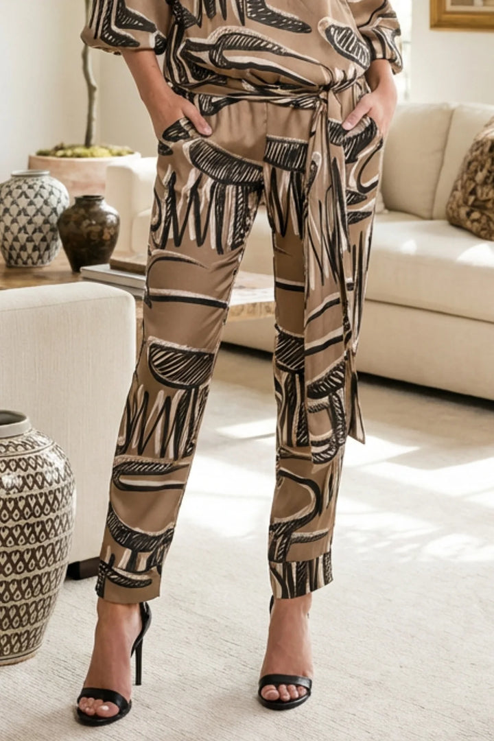 Close-up of Expression print on Costa Pant fabric.