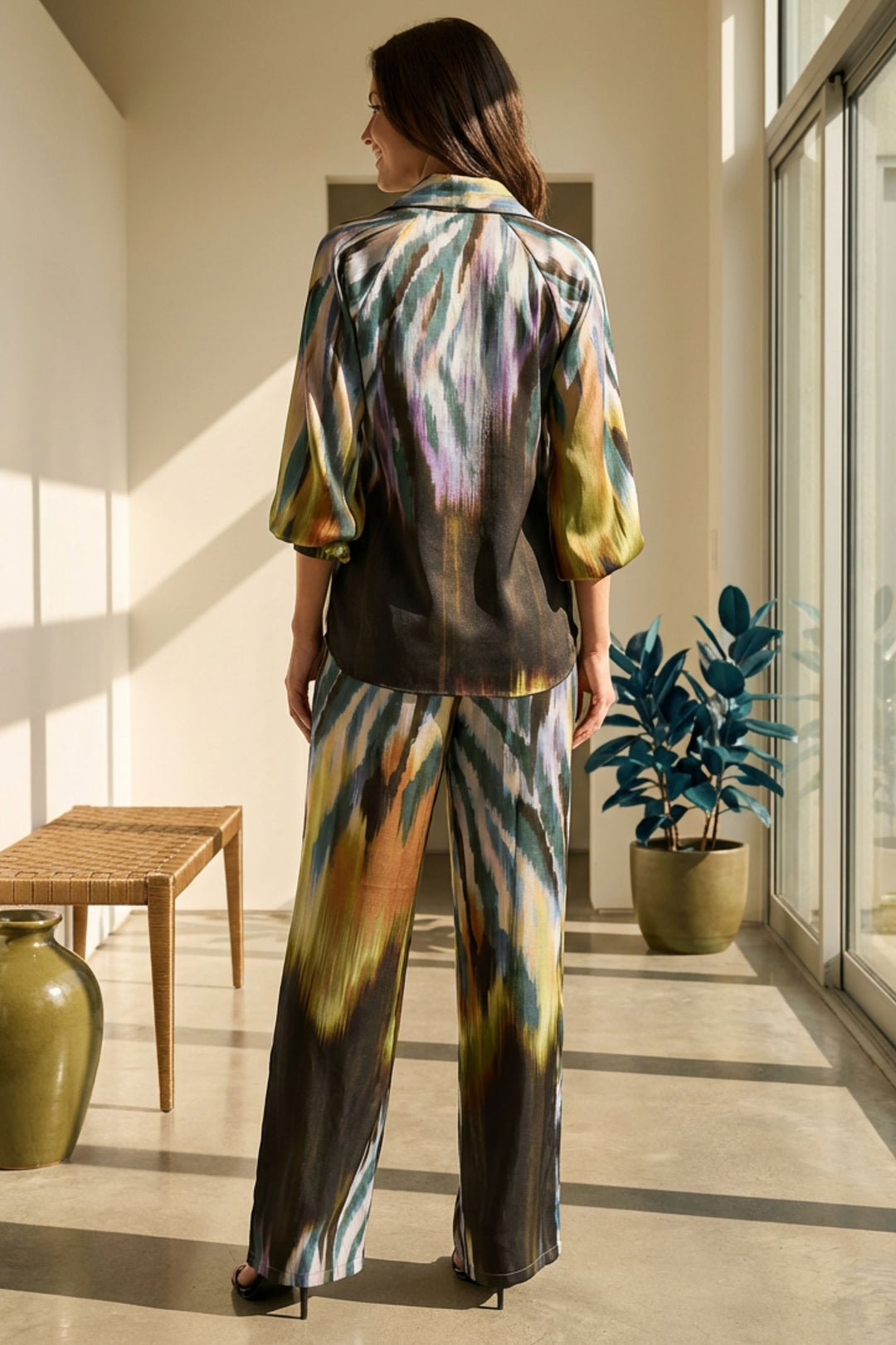 Alis Pant in motion featuring vibrant Africa pattern.