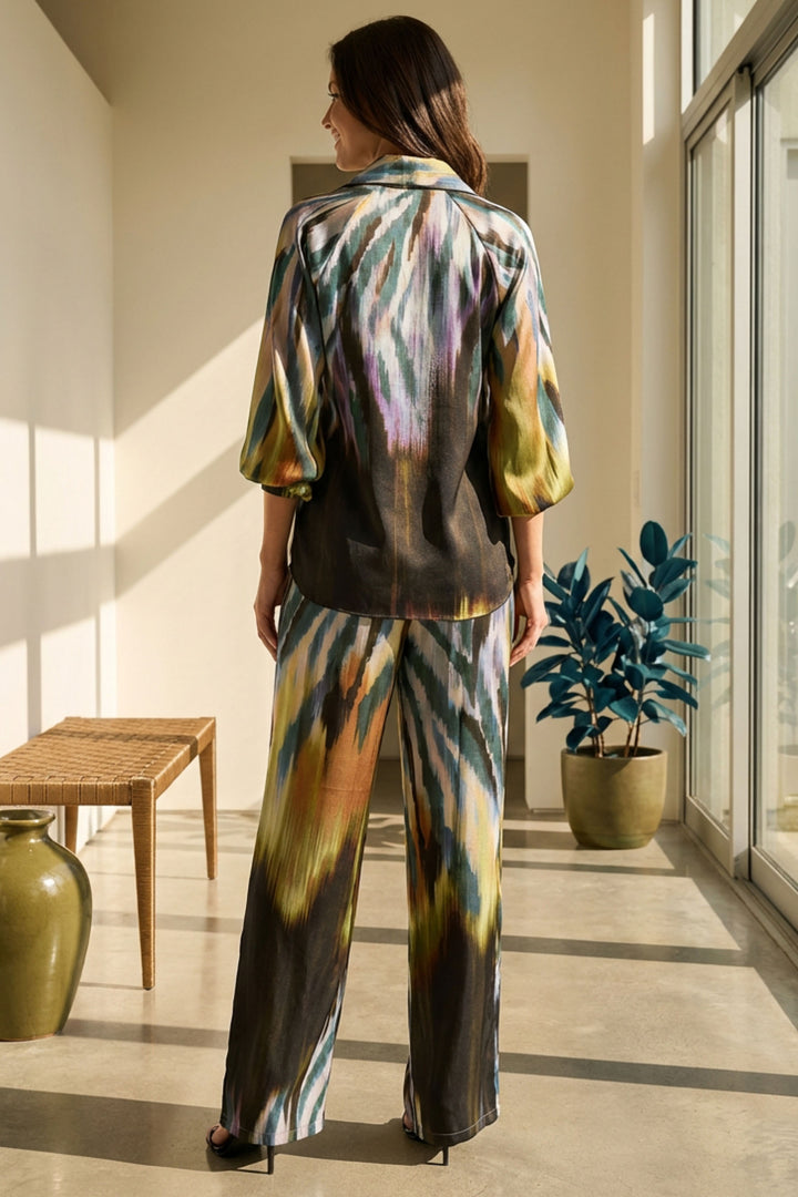 Alis Pant in motion featuring vibrant Africa pattern.