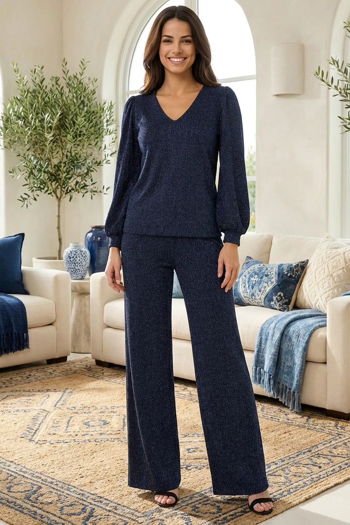 Steam Top styled with matching pants for holiday look.