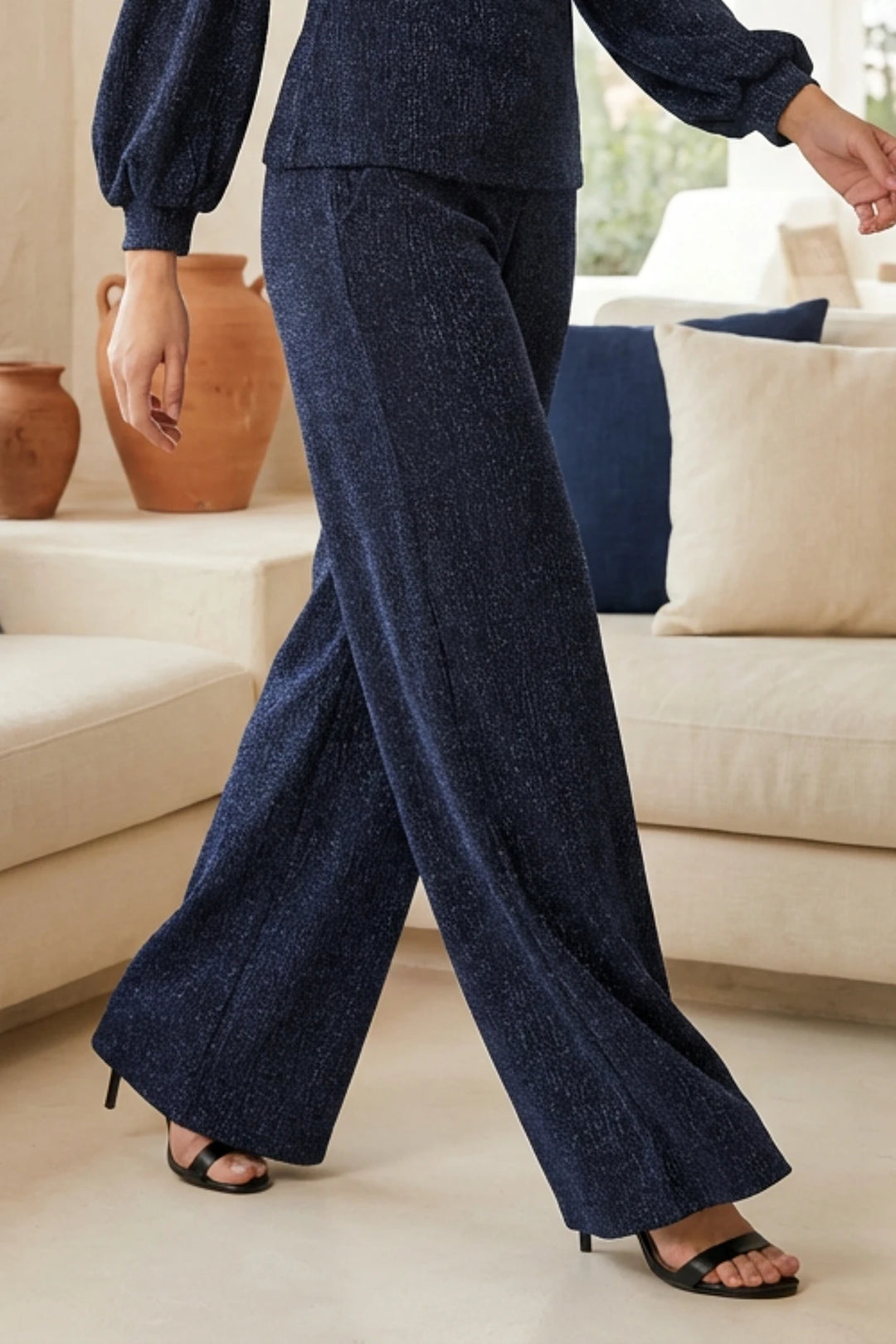 Close-up of midnight shimmer knit fabric.