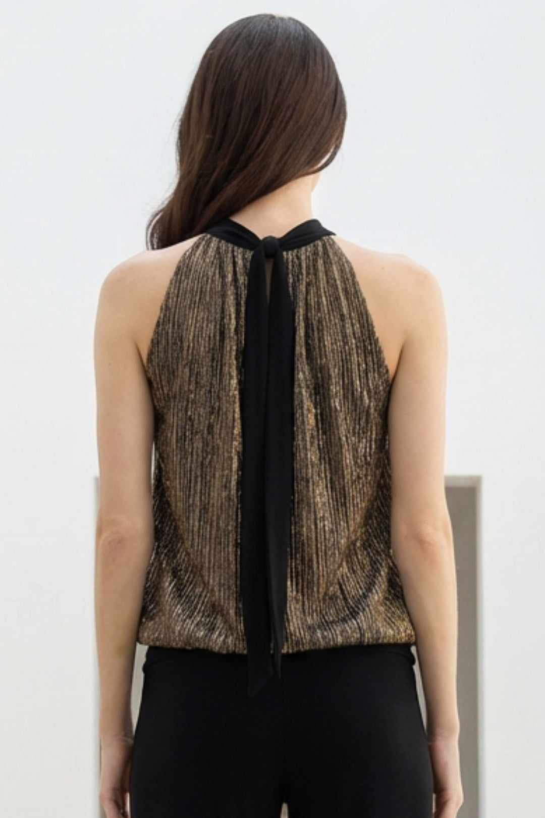 Supreme metallic halter blouse in black and gold BAck view.