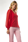 Woman wearing the v-neck cure top